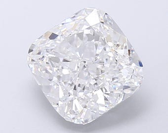 May include: A large, clear, cushion-cut diamond with numerous facets. The diamond is white and reflects light, creating a sparkling effect. The shape is square with rounded corners, typical of a cushion cut.