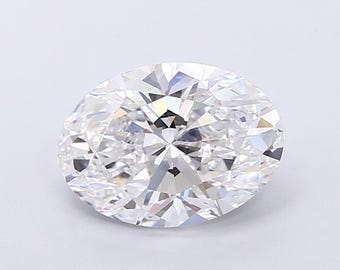 May include: A clear oval-shaped diamond with a brilliant cut. The diamond is set against a white background.