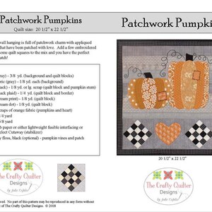 May include: Patchwork Pumpkins quilt pattern with instructions and a colour image of the finished quilt. The quilt features a grey background with appliqued pumpkins, a heart, and black and white squares. The quilt measures 20 1/2 inches by 22 1/2 inches.