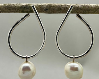 silver earrings with pearl pendant