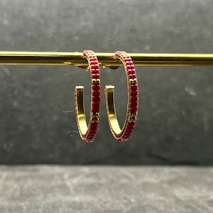 Gold hoop earrings with pink Miyuki beads
