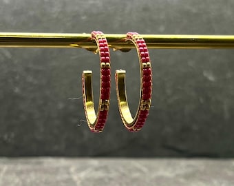 Gold hoop earrings with pink Miyuki beads