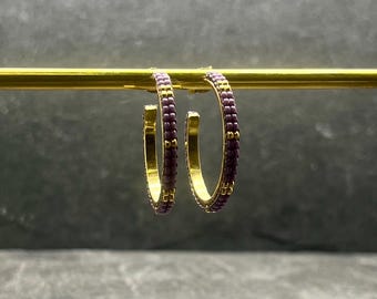 Gold hoop earrings with purple Miyuki glass beads