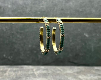 Gold hoop earrings with blue-green Miyuki beads