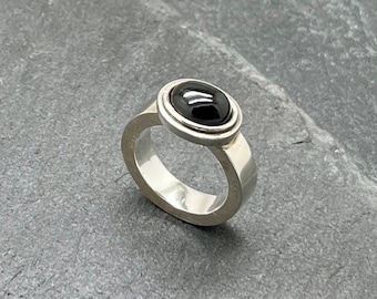 Silver ring with black star diopside
