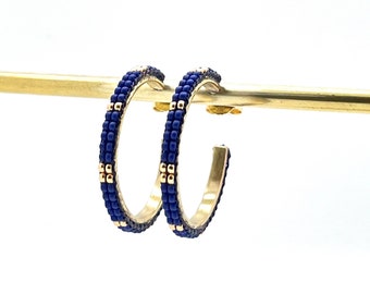 Gold hoop earrings with blue Miyuki glass beads