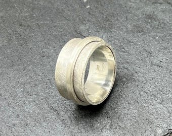 Rotating ring, spinning ring, silver ring