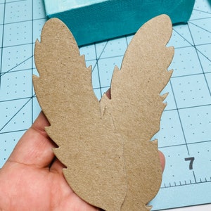 Plumas de cartón