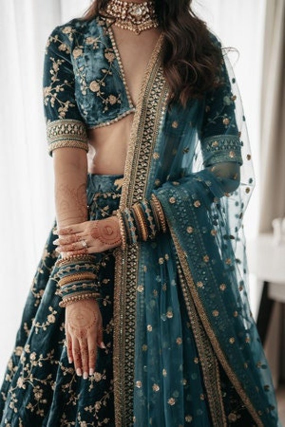 Buy SABYASACHI Green Velvet Lehenga Choli V Neck Blouse Peacock