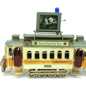 It is the classic Train model, City Tram With Photo Frame, Gifts For Streetcar Lovers and You Can Also Gift to Your Friend