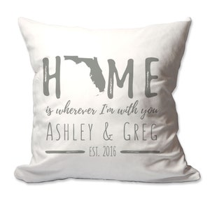 May include: White throw pillow with gray text that reads "HOME is wherever I'm with you ASHLEY & GREG EST. 2016". The text is in a handwritten font. The state of Florida is depicted in gray in the middle of the word "HOME".