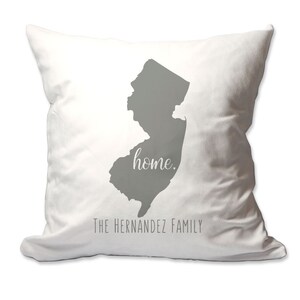 May include: White throw pillow with a gray outline of the state of New Jersey and the word "home."  The text "The Hernandez Family" is printed below the state outline.