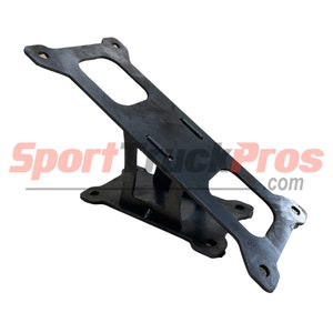 May include: Black metal bracket with two rectangular cutouts. The bracket is angled and has multiple holes for mounting.
