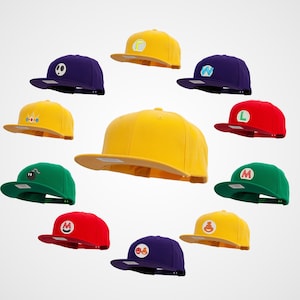 May include: A collection of 10 baseball caps with various colourful designs and logos. The caps are all yellow, red, green, blue, or purple.