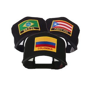 May include: Three black baseball caps with mesh backs, each featuring a flag patch. The flags represent Brazil, Colombia, and Puerto Rico. The Brazil cap has a green and yellow patch with the word "BRAZIL". The Colombia cap has a yellow, blue, and red patch with the word "COLOMBIA". The Puerto Rico cap has a red, white, and blue patch with the words "PUERTO RICO".