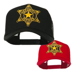 May include: Two trucker hats with a gold embroidered star and the text "SECURITY OFFICER". One hat is black and the other is red.