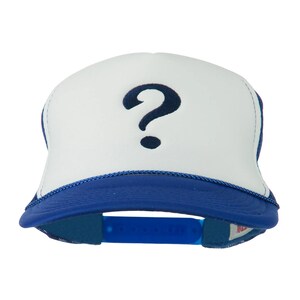May include: A white and blue trucker hat with a navy blue question mark on the front. The hat has a blue brim and a blue adjustable snap closure. The hat is a classic style.