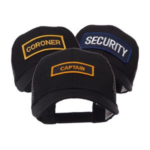 May include: Three black trucker hats with mesh backs. Each hat has a rectangular patch with white text. One hat says "CORONER" in yellow, another says "SECURITY" in white on a blue patch, and the third says "CAPTAIN" in yellow.