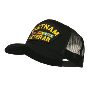 May include: Black trucker hat with a yellow "Vietnam Veteran" patch and a row of colorful ribbons.
