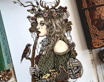 May include: An art print featuring a profile illustration of a person with long wavy hair, wearing a crown of flowers and antlers. The figure holds a wooden staff with birds, surrounded by mushrooms, foliage, and a metal helmet.