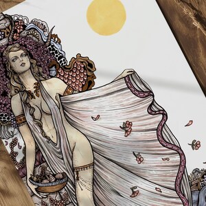 Blond-haired Aphrodite, the Greek goddess of love and beauty, holds a bowl of seashells near the ocean, surrounded by pink flowers.