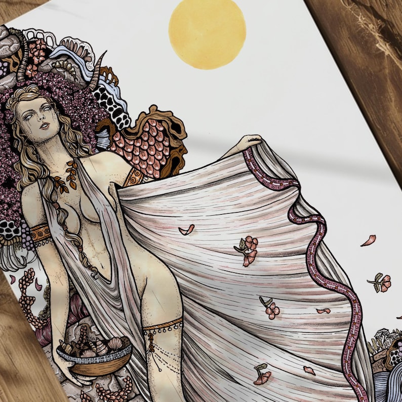 Blond-haired Aphrodite, the Greek goddess of love and beauty, holds a bowl of seashells near the ocean, surrounded by pink flowers.