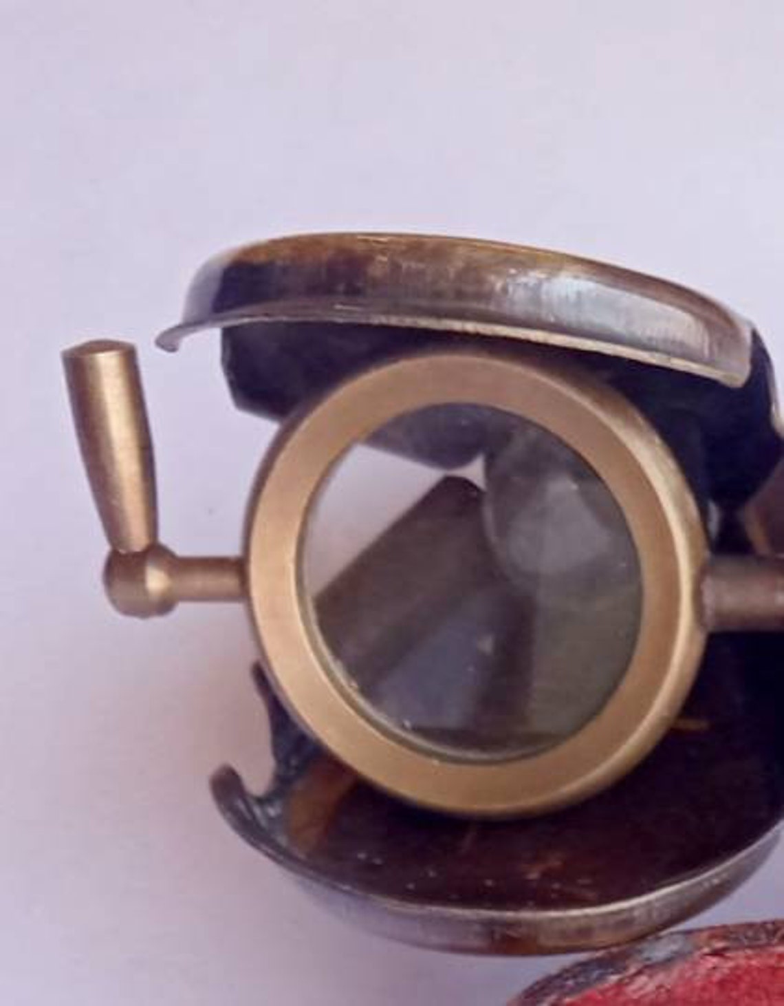 thumbnail image 2 of R & J Beck Nautical Brass Binocular Folding Monocular Telescope With Leather Case 2 of 6