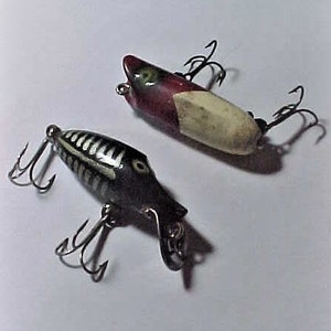 Two vintage fishing lures - Heddon River Runt and Creek Chub Bait