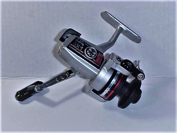 RYOBI Silver Cloud SX1 Spinning Reel W/graphite Spool Circa 1990s Pre-owned  in Very Good Plus Working Condition No Box, Action Smooth/strong -   Canada