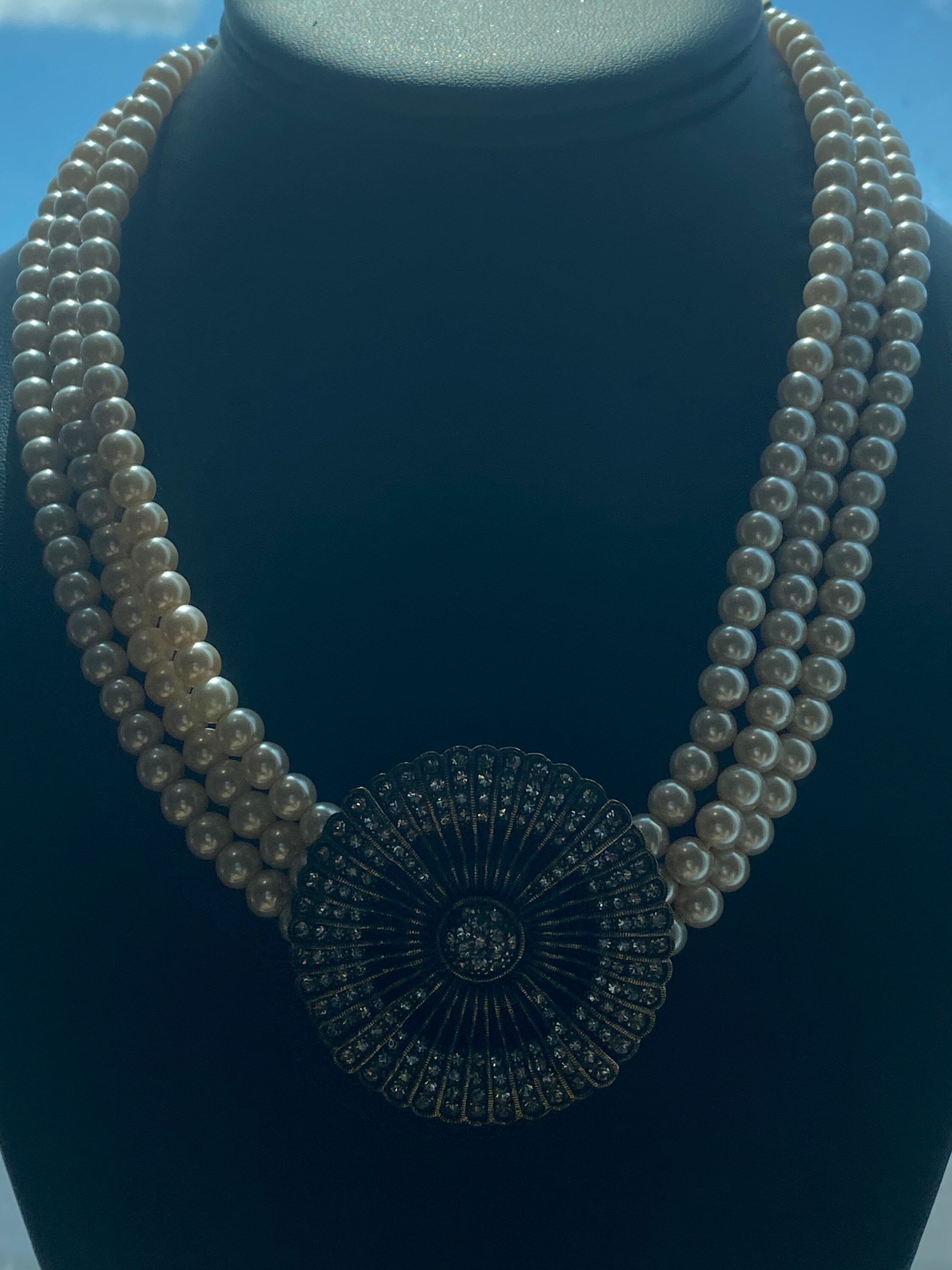 Heidi Daus Belgium Disc Necklace Bronze 