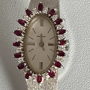 4150 – Reloj de Dama Oro Blanco Rubí Diamantes