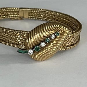 4617- Mysterious Watch Yellow Gold Platinum Diamonds Emeralds
