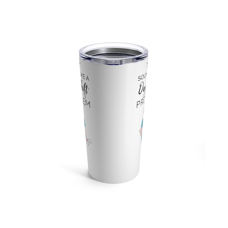 May include: White travel mug with a black and blue graphic of a woman with the text "Solving problems like a " and "shift" on the left side and "Solving problems like a " and "pro" on the right side.
