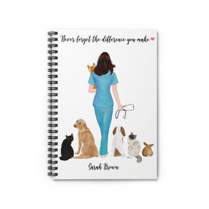 May include: A spiral-bound notebook featuring a white cover with an illustration of a person in blue scrubs holding a cat, with a stethoscope in one hand. Below are a black cat, a golden dog, a white and brown dog, a grey cat, and a rabbit. Text reads: Never forget the difference you make and Sarah Brown.