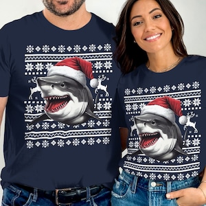 クリスマス シャーク T シャツ、面白いシャーク サンタ帽子 T シャツ、ホリデー シャーク ダサいセーター T シャツ、シャーク ラバー クリスマス シャツ、クリスマス ギフトのアイデア