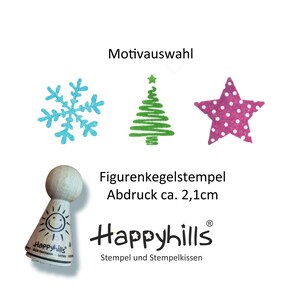Puede incluir: Una colección de sellos con diseños navideños. Incluye un copo de nieve, un árbol de Navidad y una estrella con lunares blancos. También se muestra un sello de madera con una cara de sol sonriente. El texto "Happyhills" es visible.