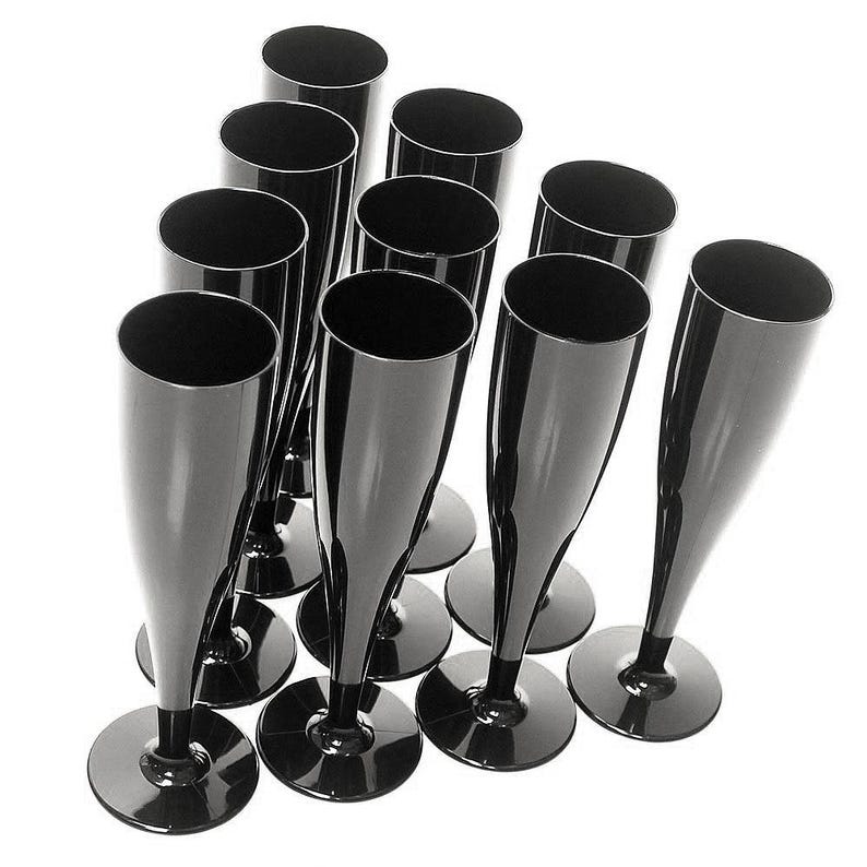 May include: A set of ten glossy black champagne flutes arranged in a cluster. Each flute features a tall, slender bowl that tapers down to a narrow stem and a circular base. The smooth, reflective surface of the plastic material is uniform.