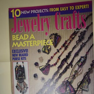 May include: A magazine cover for "Jewelry Crafts" from August 1996, featuring beaded jewelry designs. The cover has the text "10 New Projects: From Easy to Expert!" and "Bead a Masterpiece". The magazine also features "New Beaded Purse Kits".