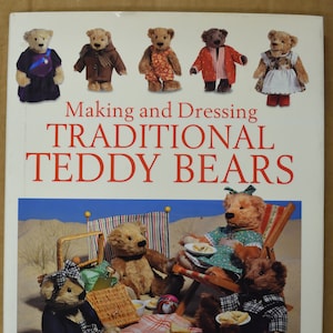 May include: Book cover titled "Making and Dressing Traditional Teddy Bears" featuring several teddy bears in various outfits. The image includes a picnic scene with teddy bears, food, and beach chairs. The authors' names, Brian & Donna Gibbs, are also visible.