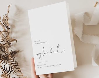 May include: A white wedding invitation card with black text. The text reads "Welcome to the wedding of Angela + Daniel" and "April 25, 20XX, St. Mary's Church | Portland, OR".