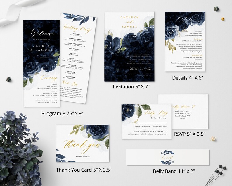 May include: Wedding invitation suite with navy blue watercolor floral designs and gold accents. The set includes an invitation, RSVP card, details card, program, thank you card, and belly band. The invitation measures 5 inches by 7 inches, the RSVP card measures 5 inches by 3.5 inches, the details card measures 4 inches by 6 inches, the program measures 3.75 inches by 9 inches, the thank you card measures 5 inches by 3.5 inches, and the belly band measures 11 inches by 2 inches.