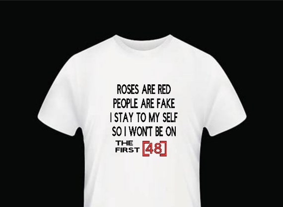 white t shirt with red writing