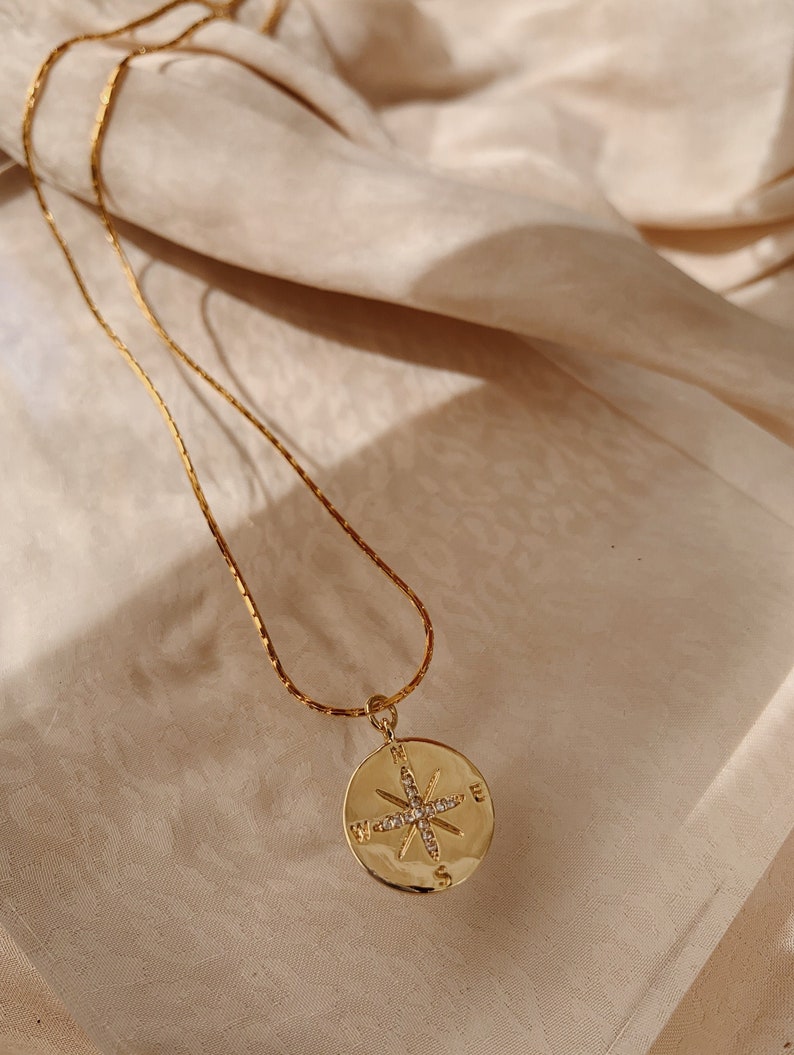 N.S.E.W Necklace