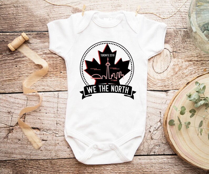 raptors baby onesie