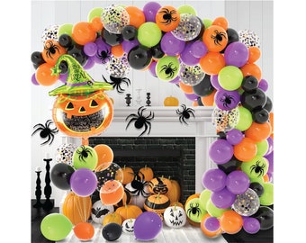 May include: Halloween party decorations with a balloon arch made of orange, purple, green, black, and clear balloons with confetti inside. The arch is decorated with black spider cutouts. A large orange and green pumpkin balloon with a witch's hat is in the center of the image.