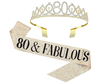 May include: Gold glitter sash with black text that reads "80 & FABULOUS". A gold tiara with rhinestones and the number 80 in the center.