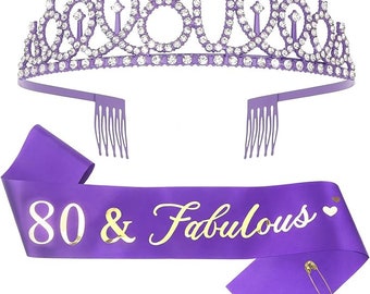 May include: Purple satin sash with gold lettering that reads "80 & Fabulous" and a purple tiara with rhinestones and the number 80.