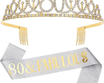 May include: Gold-colored tiara with rhinestones, featuring the number 80. A silver glitter sash with the text "80 & FABULOUS" is included.