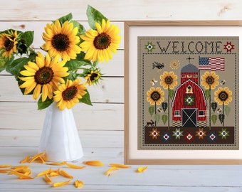 May include: Cross-stitch pattern featuring a red barn with a white door and windows, surrounded by sunflowers and bees. The pattern also includes a small American flag and the word "WELCOME" in a banner above the barn.