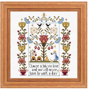 Può includere: Schema di ricamo a punto croce con un albero stilizzato con fiori, api e uccelli. Il testo "Choose a Job you love and you will never have to work a day" è in fondo al disegno.